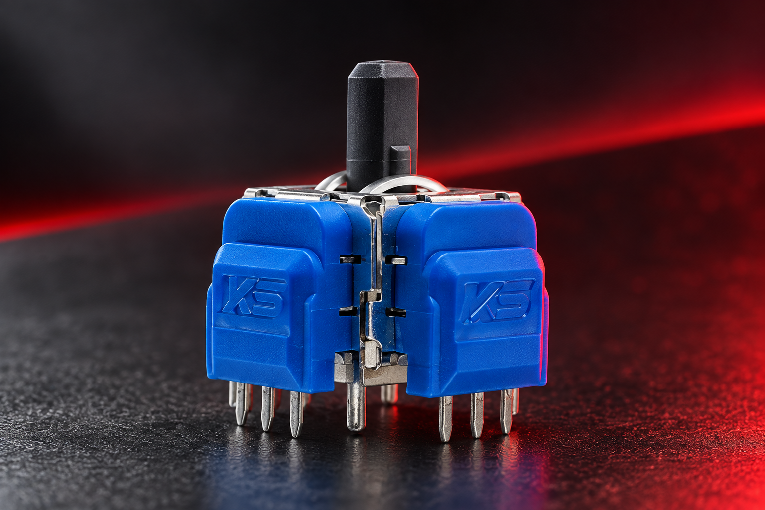 Module joystick TMR PS5 bleu présenté en gros plan sur un fond studio sombre